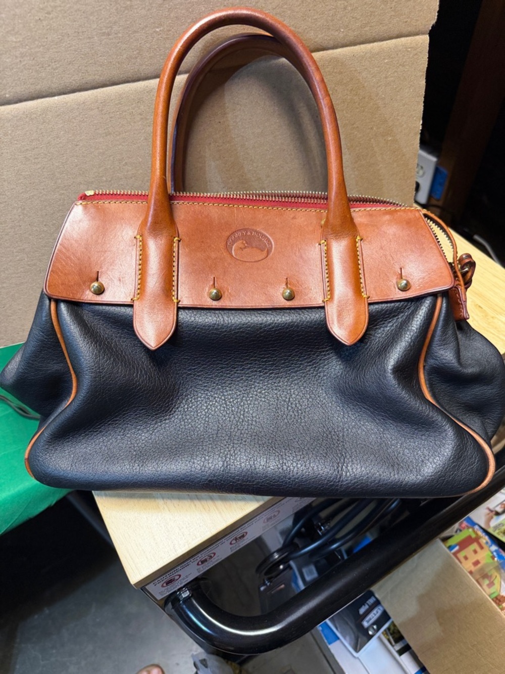 Dooney & Bourke Black Pebbled Leather Satchel with Brown Trim and Handles